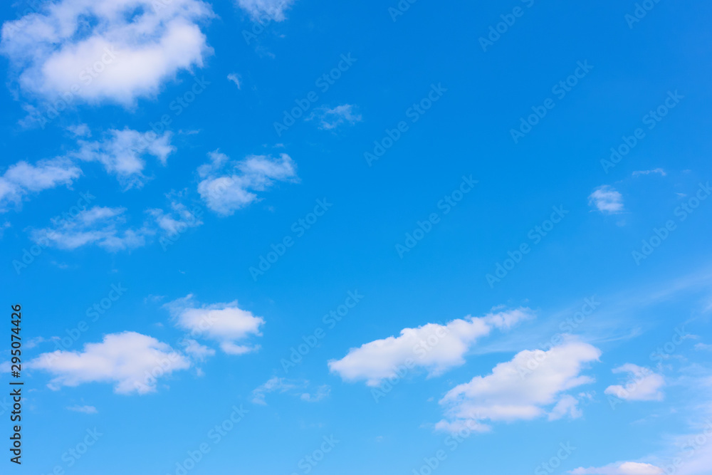 Blue sky with light white clouds -  background