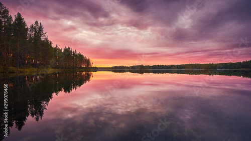 Rose sunset colors at the lake in Karelia