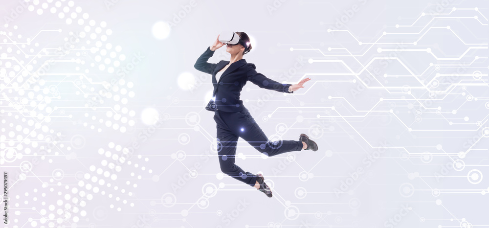 panoramic shot of businesswoman in virtual reality headset levitating on grey background with abstract cyberspace illustration