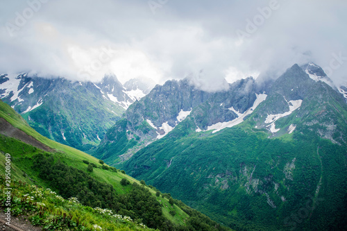 mountain landscape - mountains forest  rocks glaciers snow clouds  Dombay  Karachay-Cherkessia  Russia