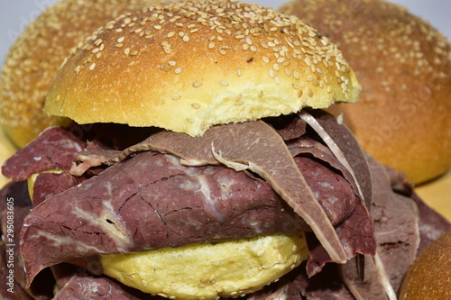 Panino con milza, tipico cibo da strada della città di Palermo, Sicilia. Focaccia con milza photo