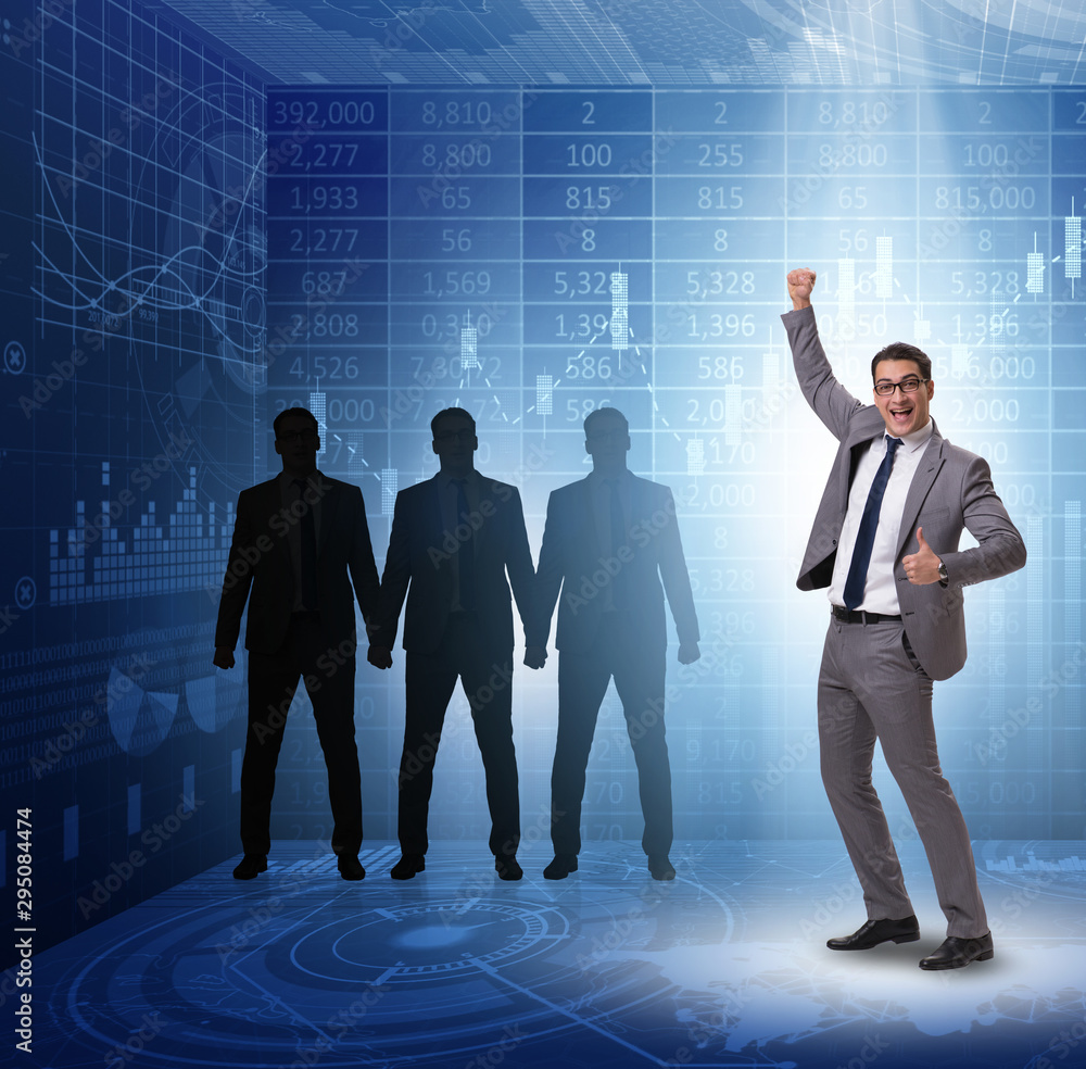 Businessman in the spotlight in business concept Businessman in the spotlight in business concept