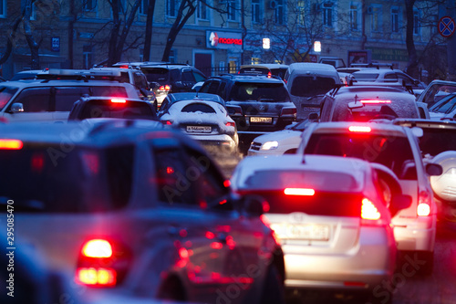 Car traffic jams due to snowfall in the evening.