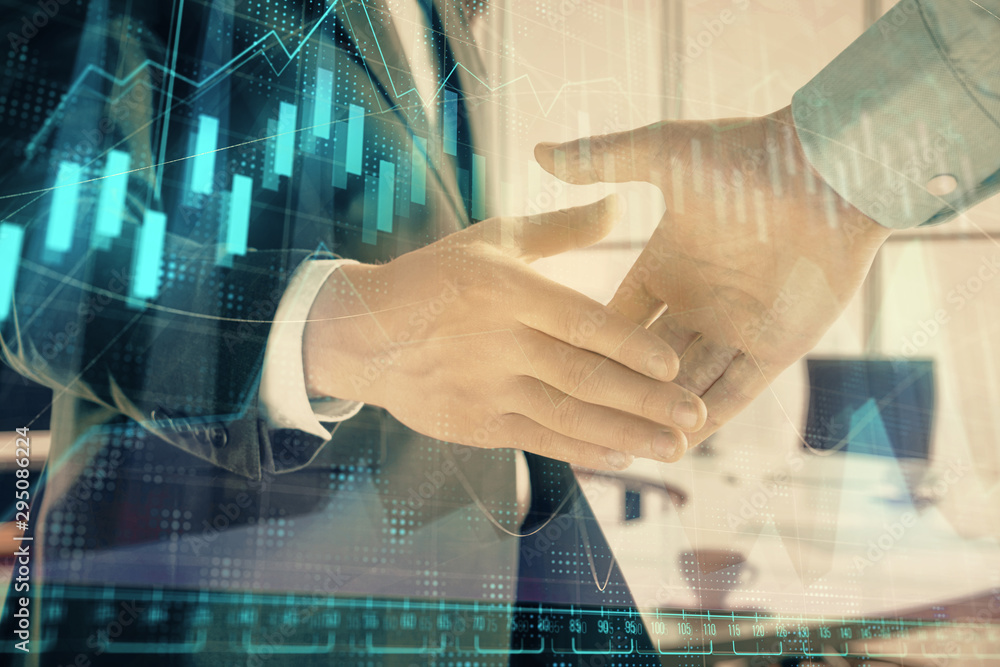 Multi exposure of financial graph on office background with two businessmen handshake. Concept of success in business Multi exposure of financial graph on office background with two businessmen handshake. Concept of success in business