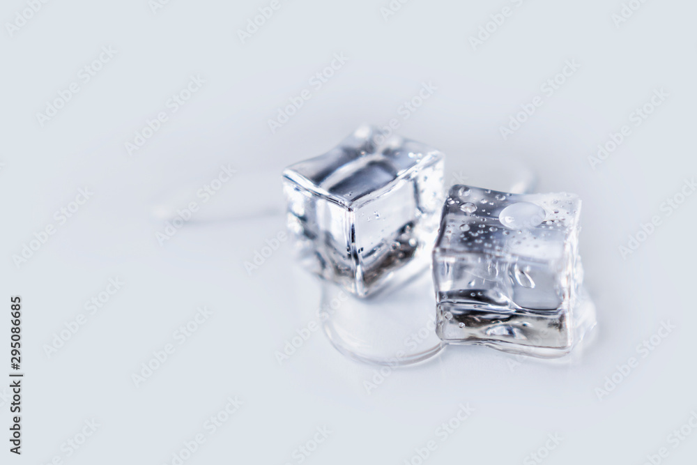 ice cubes with drops of water on white background ice cubes with drops of water on white background
