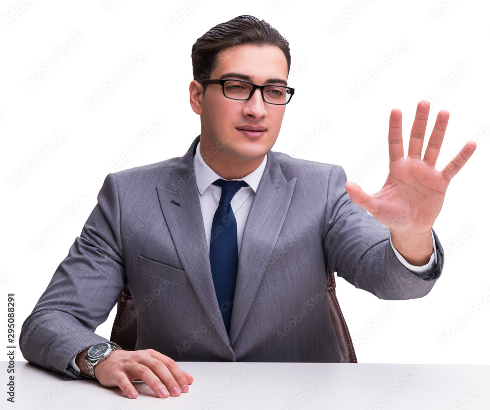 Young businessman pressing virtual buttons isolated on white bac Young businessman pressing virtual buttons isolated on white bac