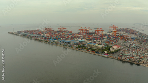 Aerial view of container terminal in the city of Manila. Largest cargo port. modern harbor and global trade background ,Philippines.