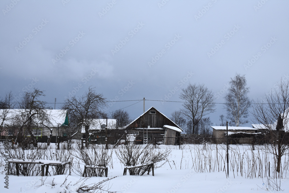 Old wooden houses in winter.