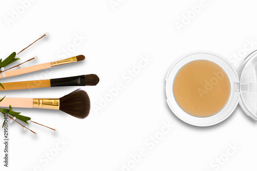 Cosmetic set of make up brushes and face powder on white background - Flat Lay Copy Space, top view