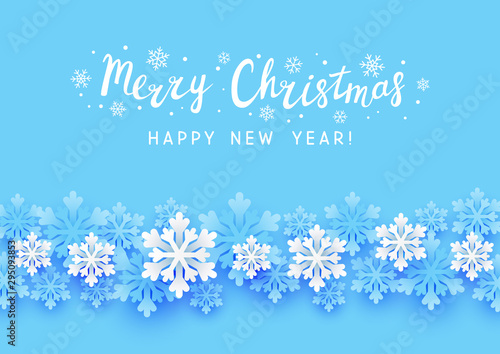 Christmas greeting card with paper snowflakes border on blue background for Your holiday design