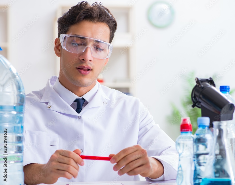 Lab assistant testing water quality Lab assistant testing water quality