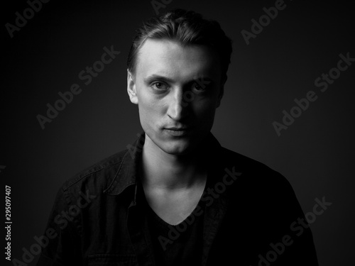Portrait of serious young man. Black and white