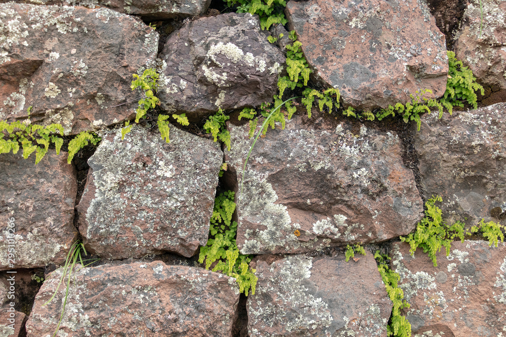 Natural stone abstract background wall made by ancient Inca of Peru in South America. Background with copy space