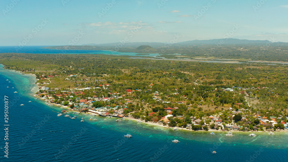 Coastline with coral reef and blue water, diving site, Moalboal, Philippines. Aerial view, Summer and travel vacation concept.