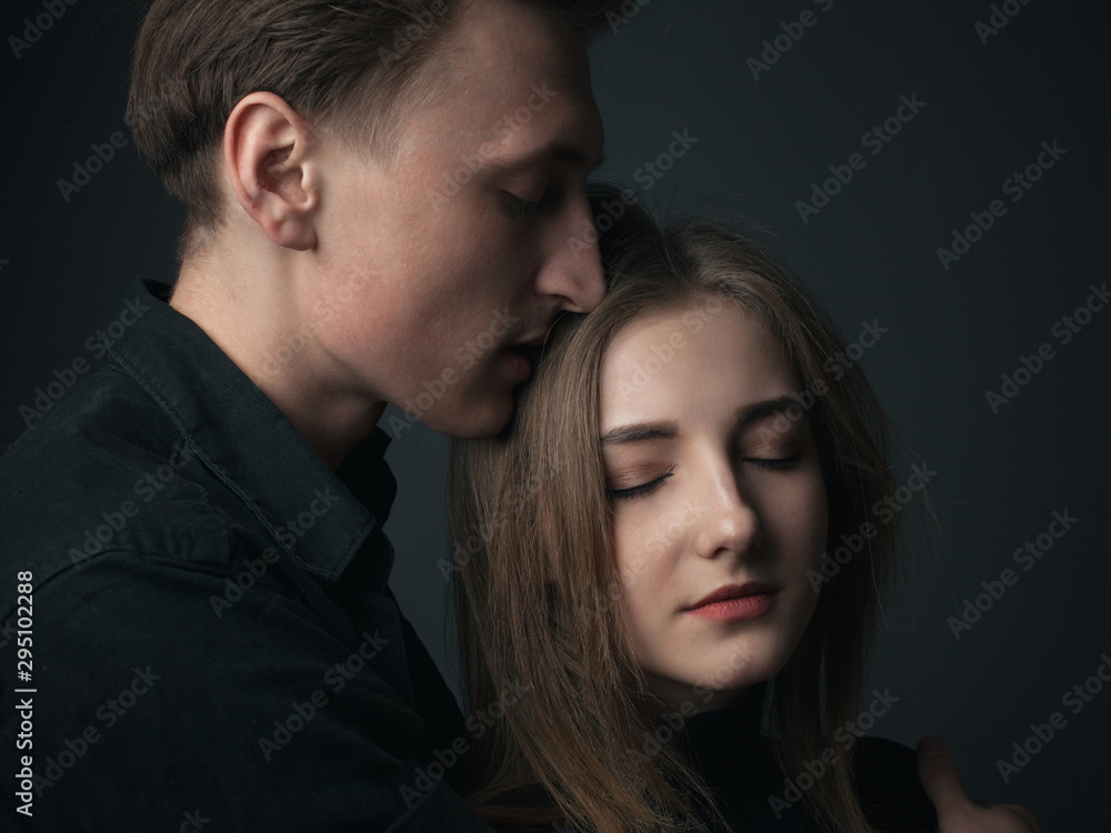 Portrait of passionate young couple in love. Close up. Portrait of passionate young couple in love. Close up.
