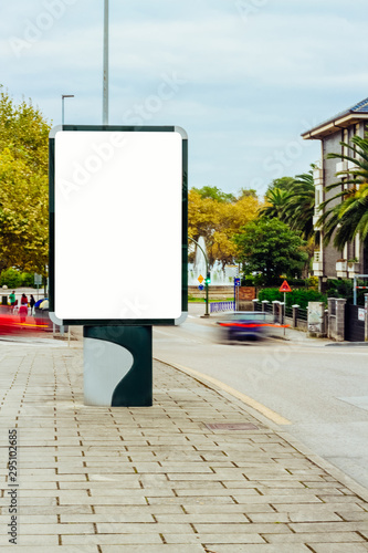 Vertical street poster billboard blank mock up in the city