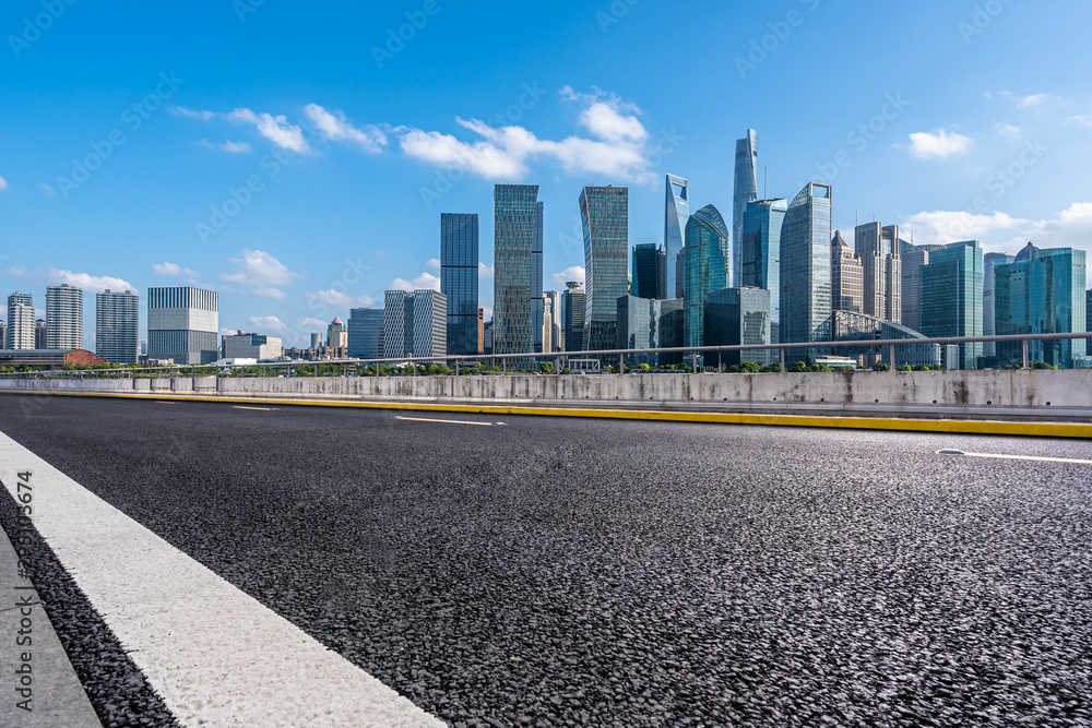 city skyline with empty road in shanghai china city skyline with empty road in shanghai china