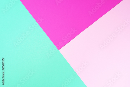 Background in trendy green and pink colors. Fashionable paper. Top view. Minimal concept. Trendy mint color