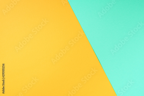 Colorful trendy green and yellow paper background. Top view. Copy space