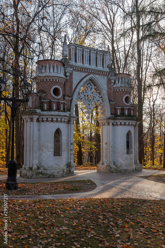 Grape gate in Neo-Gothic style in the landscape Tsaritsyno park in Moscow, Russia