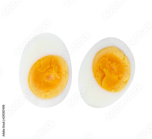 Sliced hard boiled egg on white background