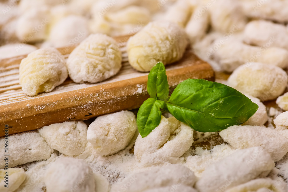 Fototapeta premium Cook homemade gnocchi on the table, Italian tradition