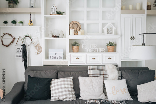 Obraz na płótnie Home decor - Bright cosy comfy white living room with winter decorations for family or couple. w salonie