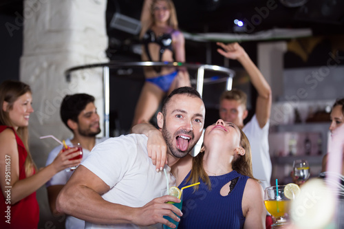 couple in the night club with drinks