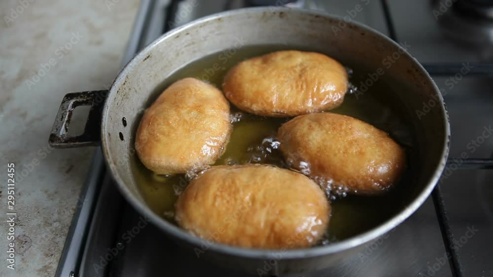 Homemade pies with potatoes are fried in sunflower oil. Homemade pies with potatoes are fried in sunflower oil.