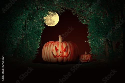 Halloween pumpkins at night under the full moon in the forest.