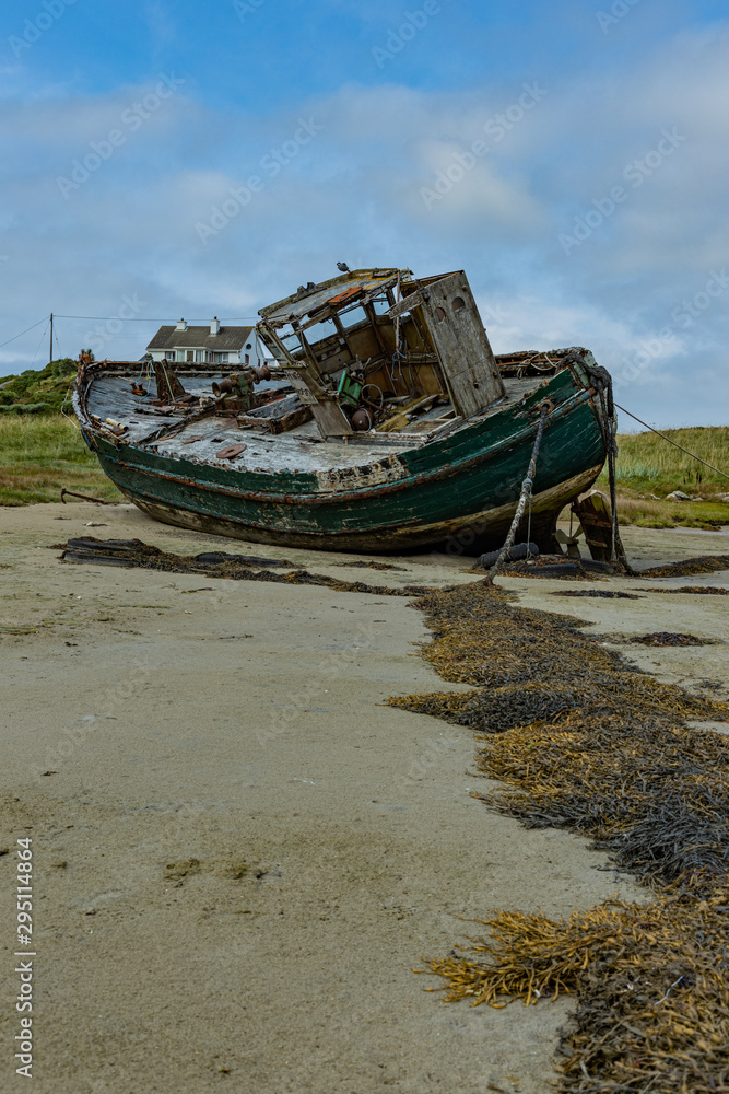 Fishing boat wreck Star of the Sea beached on Cruit Island, Wild Atlantic Way, County Donegal, Ireland Fishing boat wreck Star of the Sea beached on Cruit Island, Wild Atlantic Way, County Donegal, Ireland