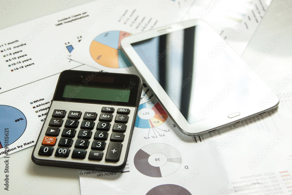 Planning finance and business online by flow chart money company put with calculator and tablet, Data for check and presentation to company Planning finance and business online by flow chart money company put with calculator and tablet, Data for check and presentation to company