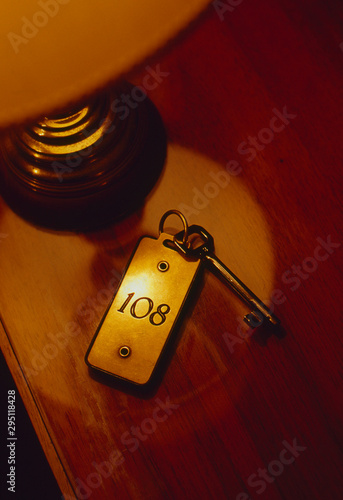 Room 108 key illuminated by room lamp.