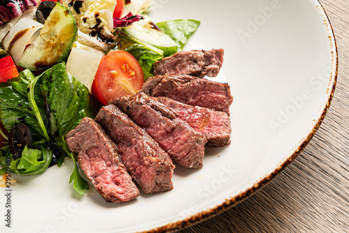grilled meat with fresh salad