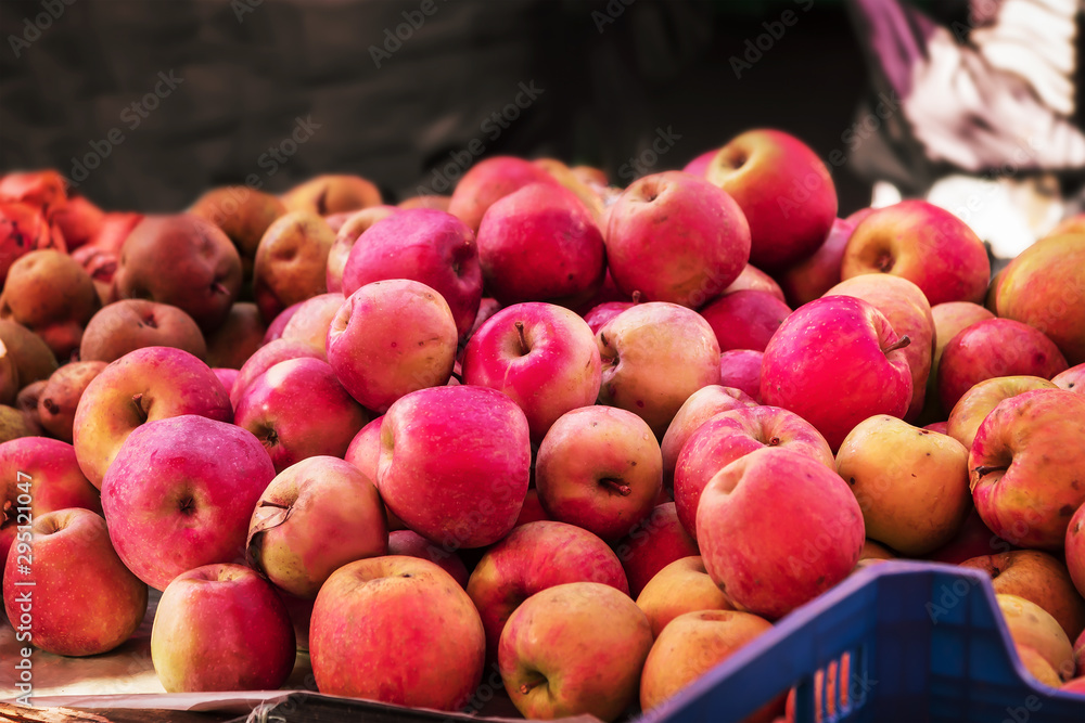 Red apple at the market, autumn harvest sale. Shallow depth of field Red apple at the market, autumn harvest sale. Shallow depth of field