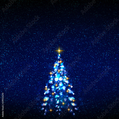 Colorful Christmas tree isolated on blue sky background.