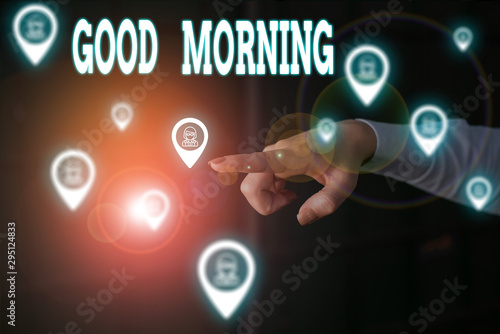 Writing note showing Good Morning. Business concept for expressing good wishes on meeting or parting during the morning Woman wear formal work suit presenting presentation using smart device