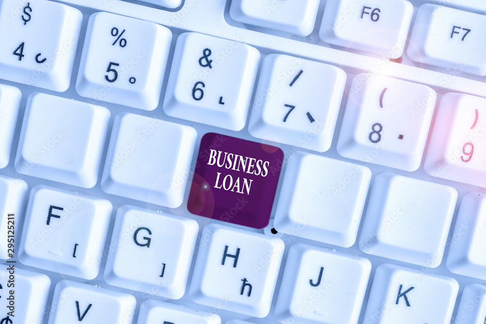 Text sign showing Business Loan. Business photo text Credit Mortgage Financial Assistance Cash Advances Debt White pc keyboard with empty note paper above white background key copy space Text sign showing Business Loan. Business photo text Credit Mortgage Financial Assistance Cash Advances Debt White pc keyboard with empty note paper above white background key copy space