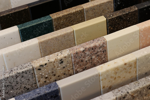 Top view of color samples stone  on oak wood table, Acrylic Solid Surface