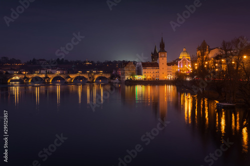 Scenic winter evening view of the Old Town ancient architecture and Vltava river pier in Prague  Czech Republic