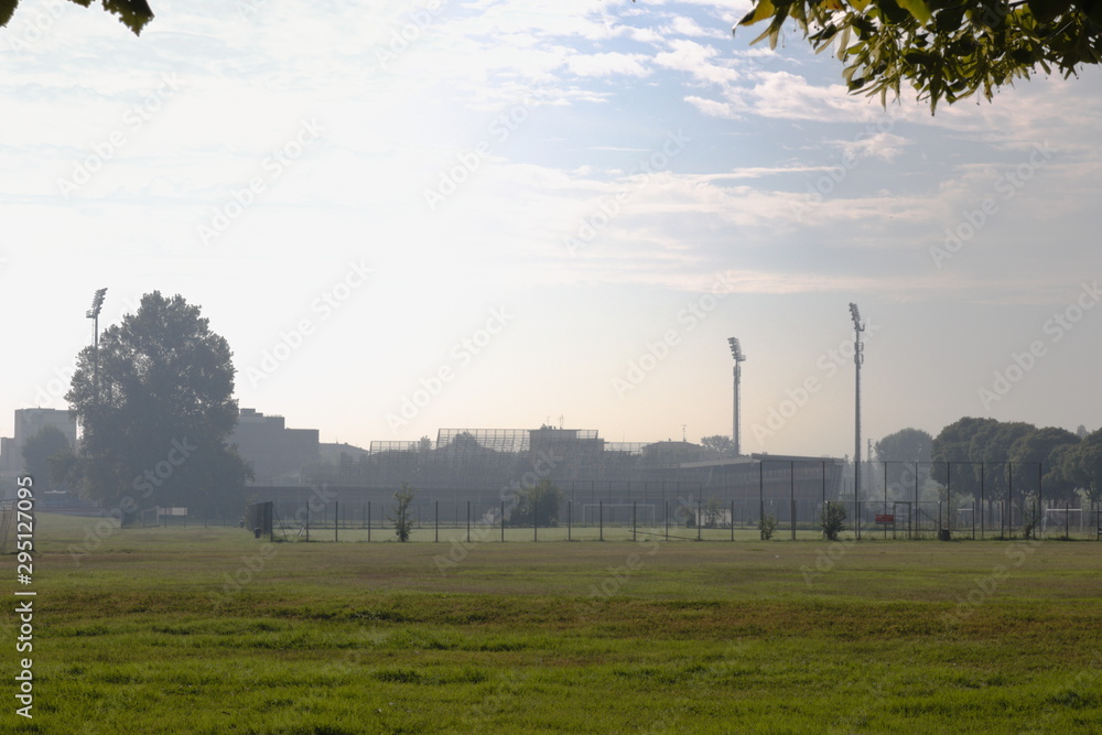 Summer, in the distance - football field, general plan, morning, Europe
