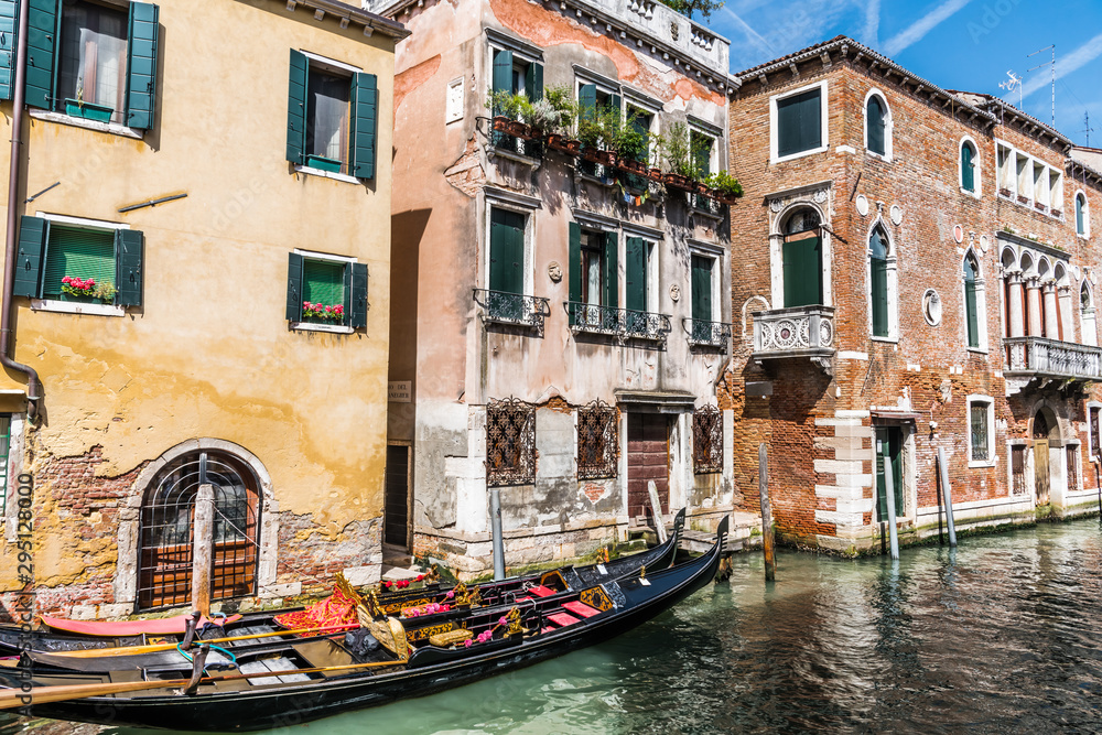 Two black gondolas at the Venetian house