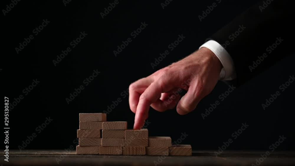 Businessman walking his fingers up the stairs Businessman walking his fingers up the stairs