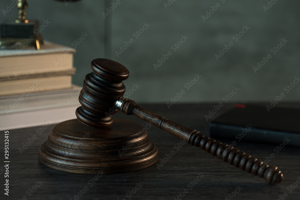 Law and Justice, judge gavel with scales on wooden table with blurred background. Law and Justice, judge gavel with scales on wooden table with blurred background.