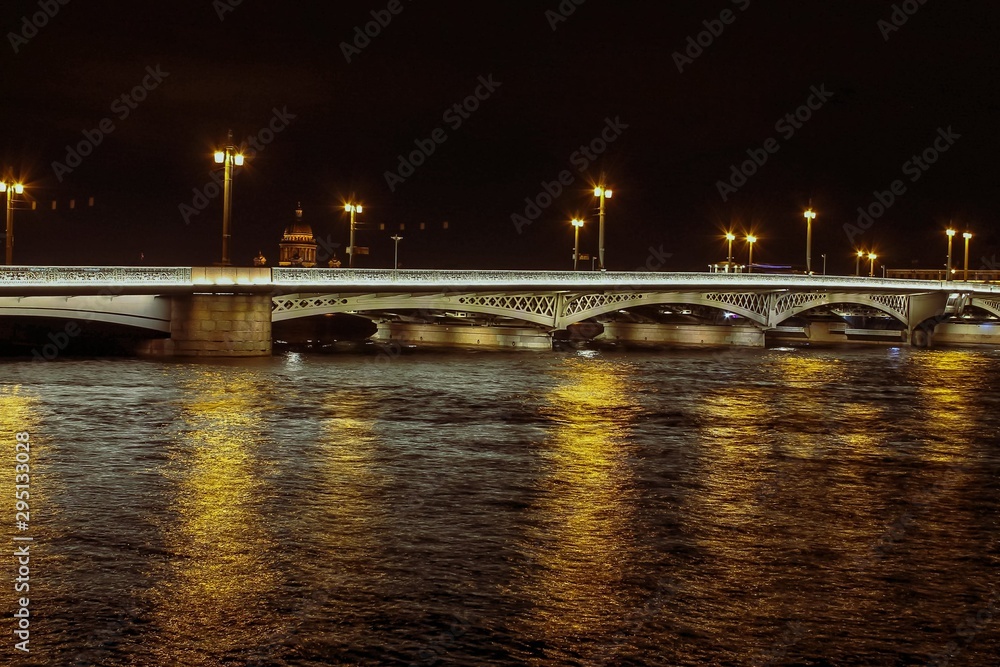 Palace Bridge over the Neva river at night.