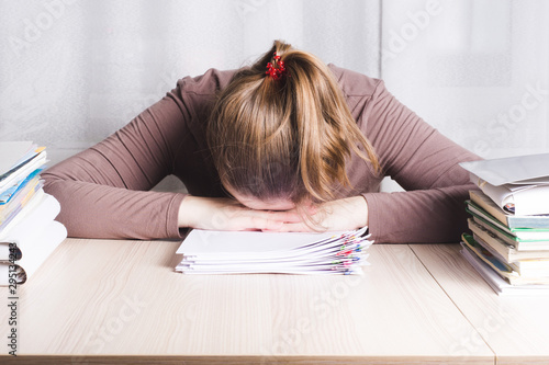 businesswoman feeling stress from work in home office