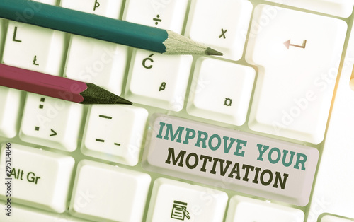 Handwriting text Improve Your Motivation. Conceptual photo Boost your self drive Enhance Motives and Goals White pc keyboard with empty note paper above white background key copy space photo