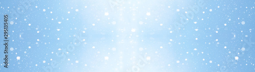Winter christmas sky with falling snow -background panorama long banner