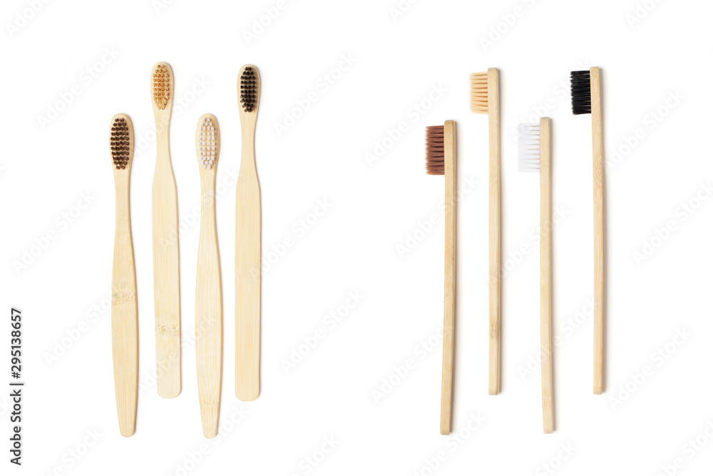Four eco-friendly bamboo toothbrushes in two ways isolated on the white background. Zero waste concept, plastic-free, organic, eco-friendly shopping Four eco-friendly bamboo toothbrushes in two ways isolated on the white background. Zero waste concept, plastic-free, organic, eco-friendly shopping