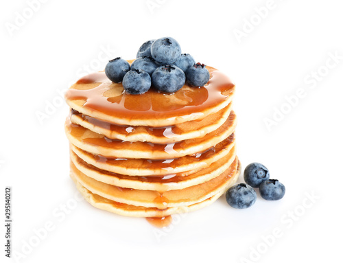 фотографія Stack of delicious pancakes with fresh blueberries and syrup on white background